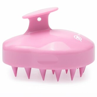 Pink scalp massager brush with handle and soft bristles